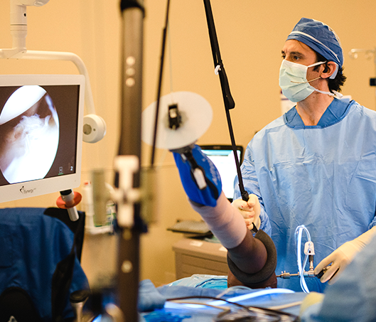 Dr. Adam Anz performs surgery at the Andrews Institute in Gulf Breeze, FL.